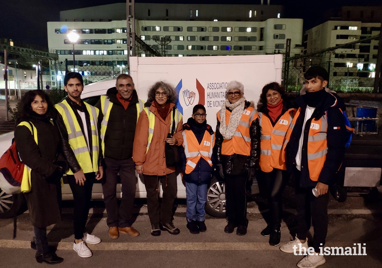 Volunteers in France distribute sandwiches, bottles of water, biscuits, and litres of soup to those in need to mark the 100th anniversary of the Ismaili Volunteer Corp.