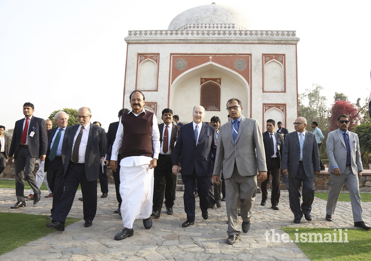 Mawlana Hazar Imam, Honourable Vice President Shri M. Venkaiah Naidu, and dignitaries tour the grounds of Sunder Nursery in New Delhi, India.