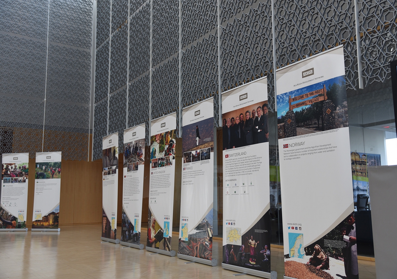 Thirty banners describing the work of the AKDN in countries around the world were arranged in the atrium of the Delegation building for the Imamat Day reception. AKDN / Safiq Devji