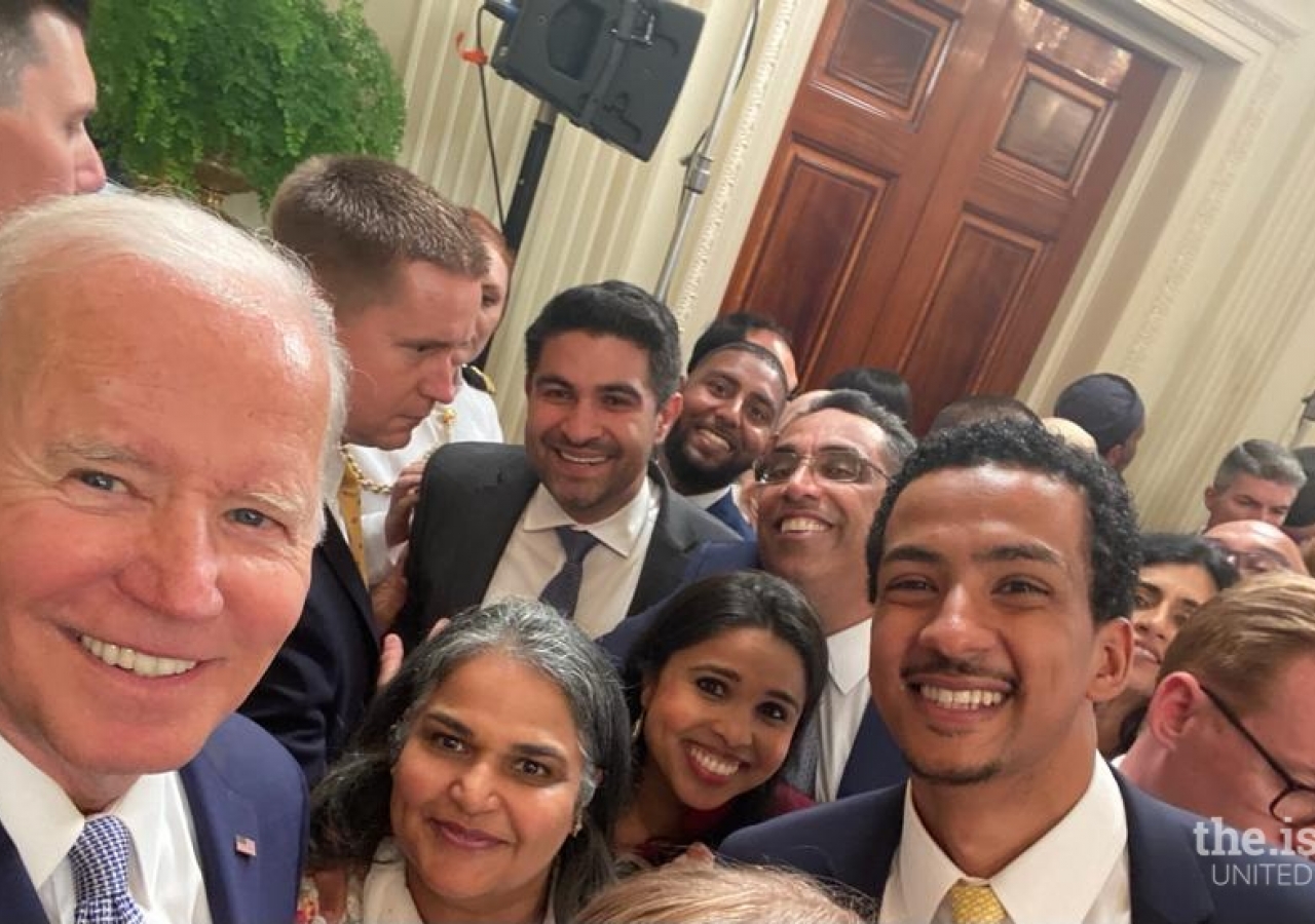 Members of the Ismaili community took an impromptu photo with President Biden during the celebration.