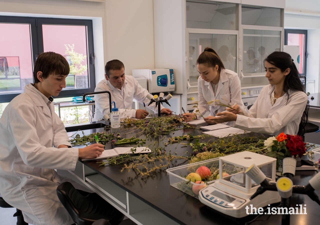 Anisa Abibulloeva (centre right) with classmates in the science laboratory at the University of Central Asia’s Khorog campus.