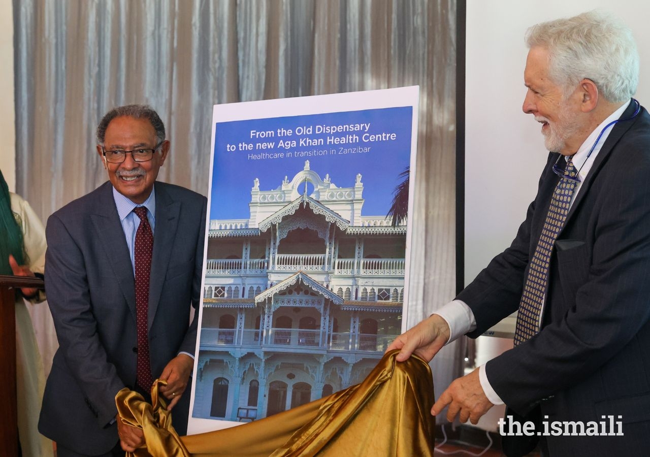 John Tomaro, former director of health for the Aga Khan Foundation, and Dr Farouk Topan, professor of Swahili culture and grandson of Sir Tharia, unveil a new book entitled "From the Old Dispensary to the new Aga Khan Health Centre."