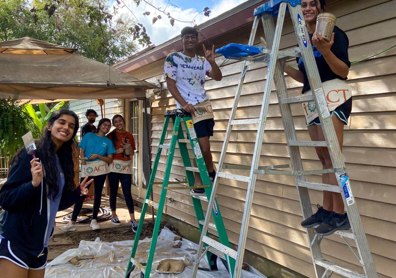Members of IMSA seen serving at Raise the Roof, an initiative of the Interfaith Action of Central Texas (iACT)