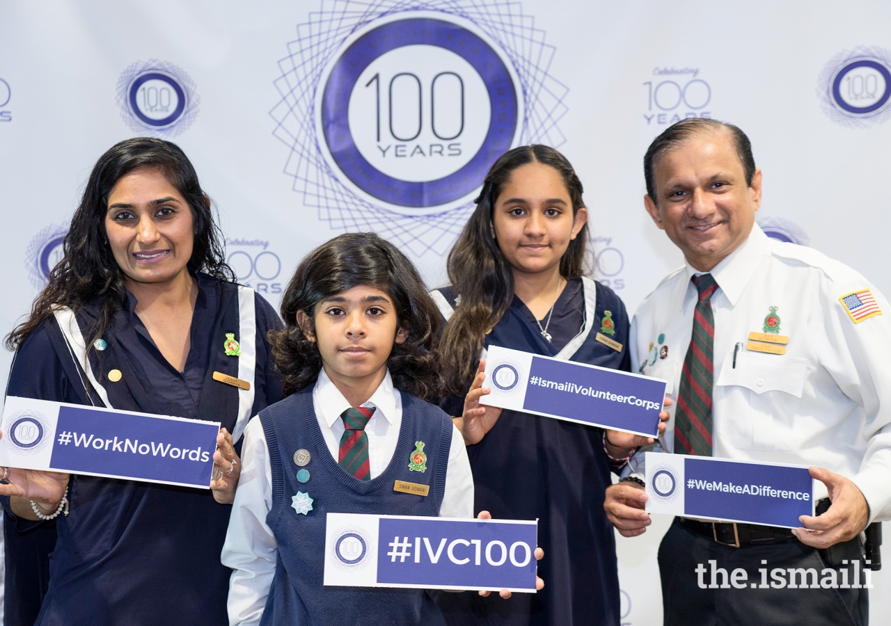 A family of volunteers celebrating IVC100 at the Memphis Jamatkhana