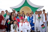 Athletes from several countries gather for a photograph following the Opening Ceremony of the Golden Jubilee Games.   