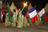 National Flags paraded during the Closing Ceremony of the inaugural Golden Jubilee Games. 