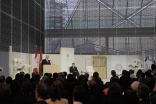 Mawlana Hazar Imam, speaking at the opening ceremony of The Delegation of the Ismaili Imamat, situated on Sussex Drive in Ottawa. Looking on, in the glass-domed atrium adorned with Jali screen is the Right Honourable Stephen Harper, PM of Canada