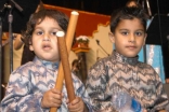 Children ready to play dandia at the Pacific National Exhibition in Vancouver.