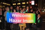 A group of Ismailis in Vancouver hold a banner welcoming Mawlana Hazar Imam to the city on the occasion of his Golden Jubilee visit to Canada.