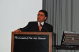 Alnoor Merchant addresses the audience at the Museum of Fine Arts in Houston.