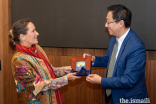 U-M President Santa Ono presents Princess Zahra with a gift of a Motawi tile during her recent visit to the Ann Arbor campus.