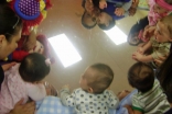 Little toddlers meet and make friends on the first day of school.