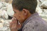 Life after the devastating floods — a boy lost in thought in Darkut, Gilgit-Baltistan.