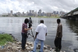 Preparing to capture the Abidjan skyline as part of a documentary feature.