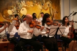 Members of the Royal Philharmonic Orchestra perform with the Ismaili Community Ensemble. 