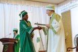 An AKU graduand in Dar es Salaam receives her degree from Mawlana Hazar Imam, the Chancellor of the Aga Khan University. AKDN / Aly Ramji