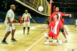 Team UK (red) competes against Team Canada (white) in a traditional volleyball match. JG/Asif Balesha