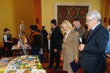 US Ambassador Elizabeth Millard and the First Deputy Minister Rahmatullo Mirboboev look at the educational material on display by the Aga Khan Foundation at the Ismaili Centre, Dushanbe. Rukhshona Broimshoeva
