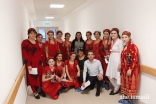 Yasmin Walji (center) celebrating Dec 13, 2019, Mawlana Hazar Imam’s birthday and one year of the opening of the Outpatient Department with AKMCK team members.