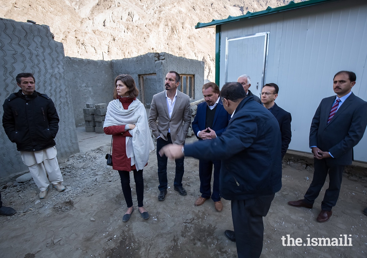 Prince Rahim and Princess Salwa visit transitional shelters being constructed by the Aga Khan Agency for Habitat (AKAH) in the aftermath of heavy flooding which submerged farmland and destroyed houses in the villages of Badswat and Bilhanz, located in Immit, Ishkoman Valley, Ghizer District in Gilgit-Baltistan. In July 2018, unusually warm weather precipitated intensified melting of snow and glaciers which resulted in a large glacial lake outburst flood (GLOF). 