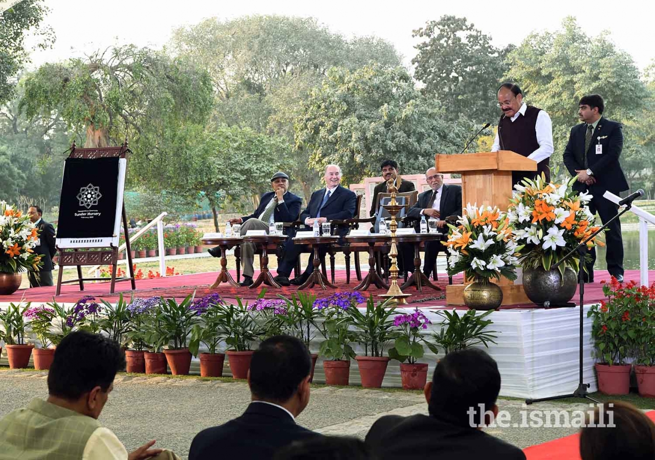 Vice President of India Shri M. Venkaiah Naidu, addresses the gathering as Mawlana Hazar Imam and Lieutenant Governor of Delhi Shri Anil Baijal, look on.