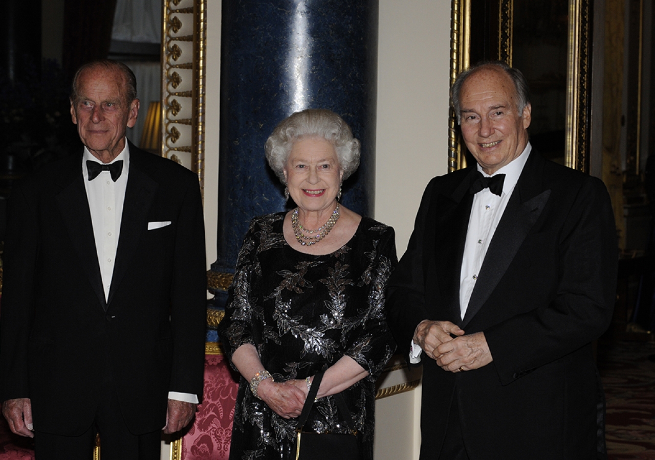 Mawlana Hazar Imam together with Her Majesty the Queen and His Royal Highness The Duke of Edinburgh, Prince Philip, during a dinner hosted in honour of Mawlana Hazar Imam at Buckingham Palace to commemorate his Golden Jubilee, London, 7 July 2008.