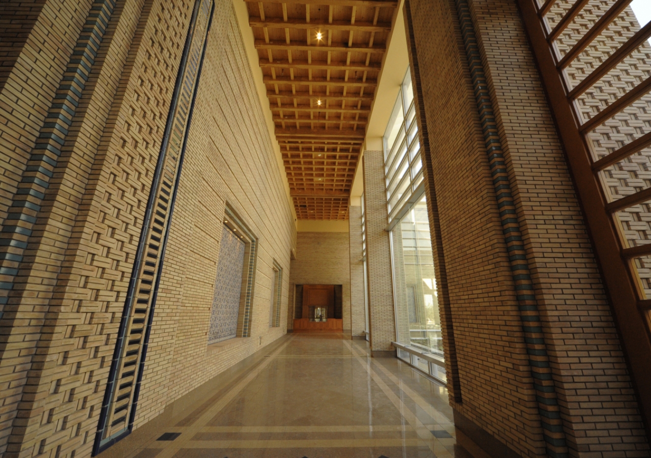 A view down the concourse between the Great Courtyard and the Prayer Hall space, looking towards the Literature Centre.