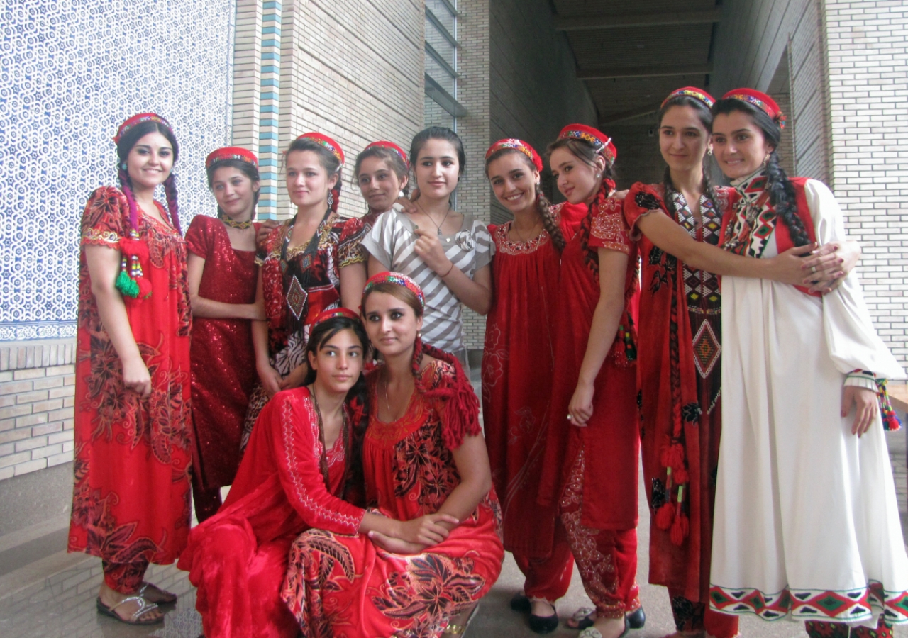 A group of volunteers dressed in traditional Tajik outfits gather for an Eid photograph at the Ismaili Centre, Dushanbe.
