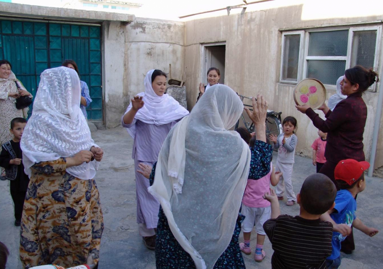 Mothers are engaged with the daily life of their children at the Sparks Academy Kabul, and often enjoy music and dancing when they come to collect their children at the end of the day.