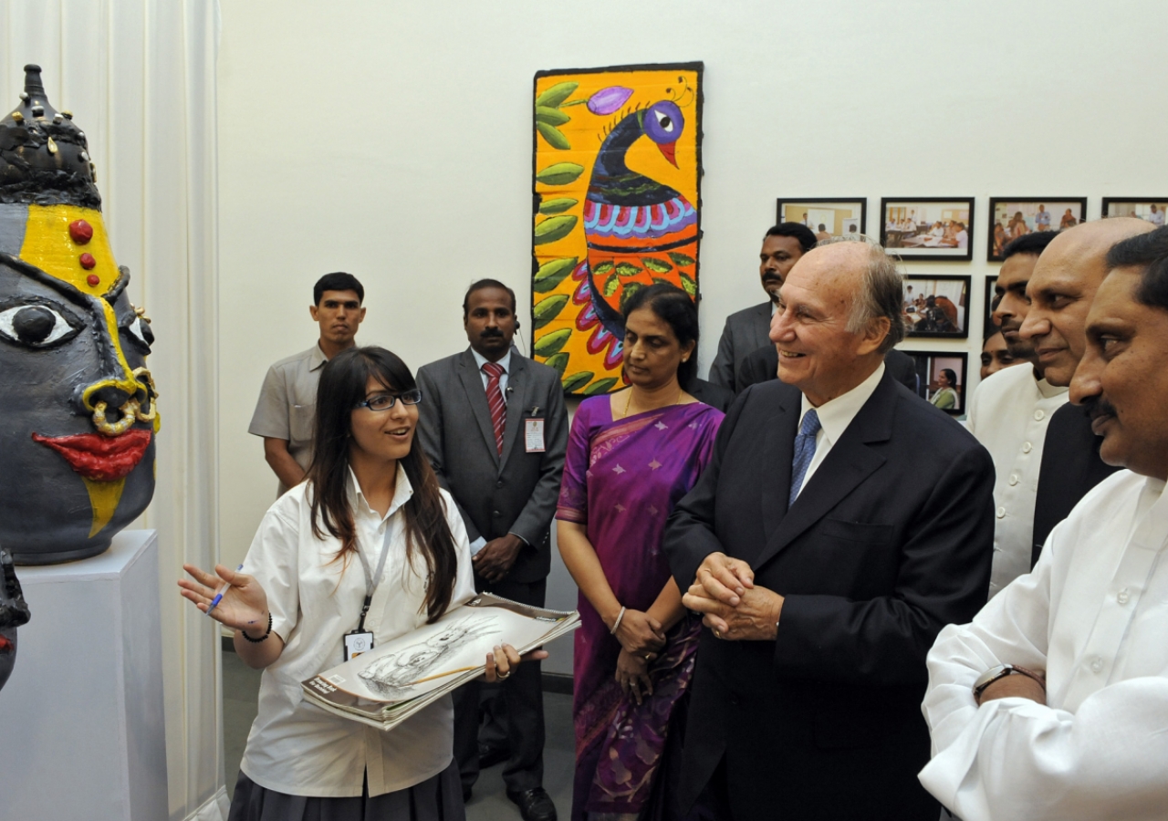 Mawlana Hazar Imam, accompanied by the Chief Minister of Andhra Pradesh and India&amp;rsquo;s Minister for Human Resource Development reviews artwork produced by a student at the Aga Khan Academy, Hyderabad.