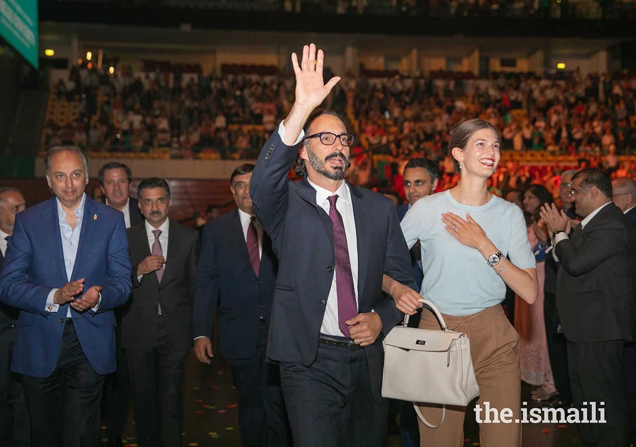 Prince Rahim and Princess Salwa acknowledge the crowd as they depart from the Altice Arena after attending the Sufi Voyage concert.