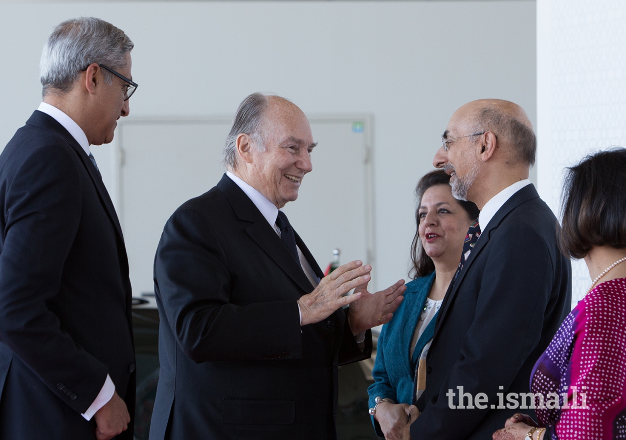 At the airport, Mawlana Hazar Imam greets Jamati leaders assembled for his departure.