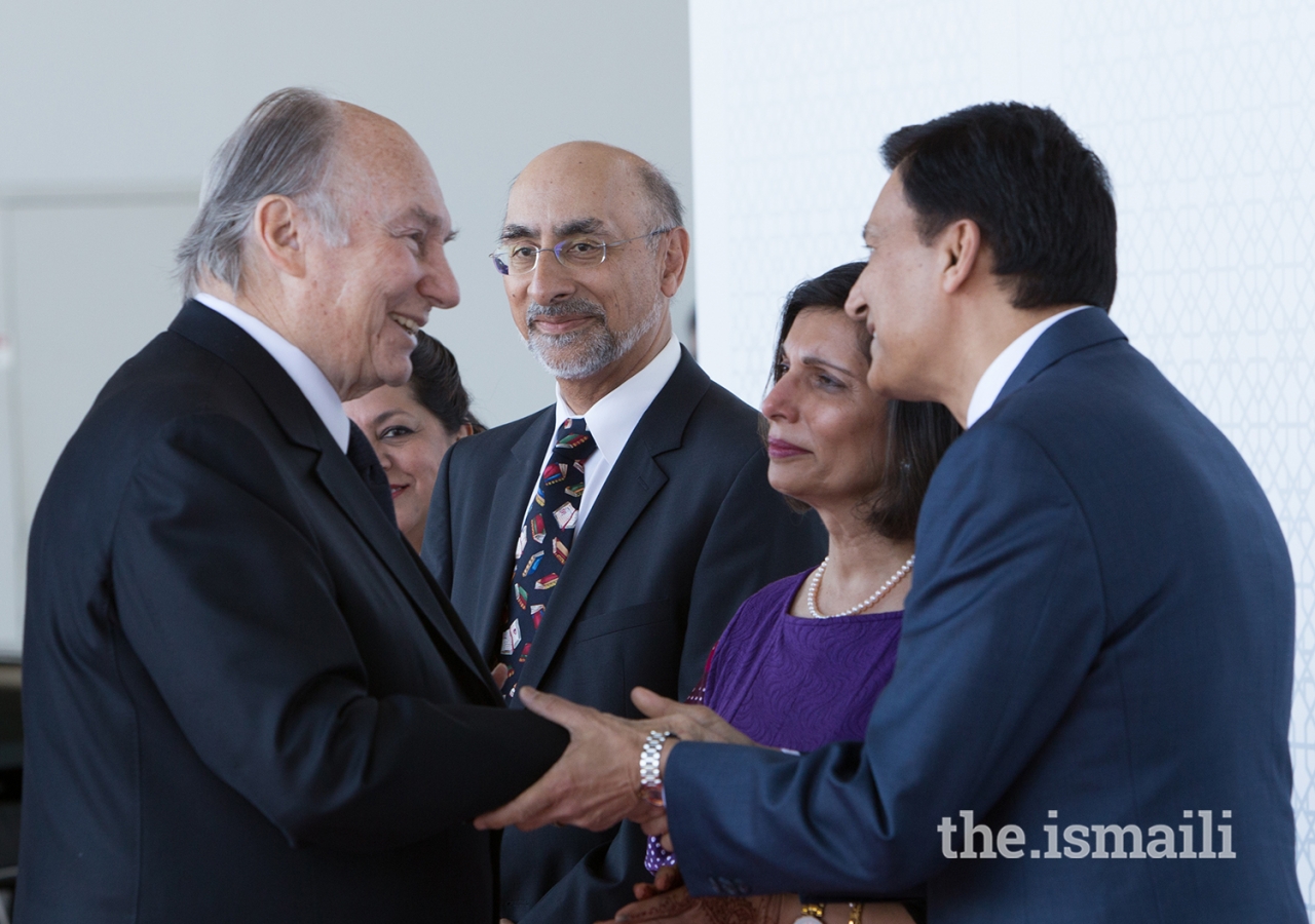 At the airport, Mawlana Hazar Imam greets Jamati leaders assembled for his departure.