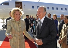 Mawlana Hazar Imam is accompanied by Charlotte Schultz, Chief of Protocol from the office of the Governor of California after disembarking in Los Angeles, California.  