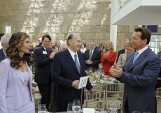 Governor Arnold Schwarzenegger and his wife, First Lady Maria Shriver, are joined by guests in a standing ovation for Mawlana Hazar Imam at a luncheon hosted by the Governor and First Lady of California. 
