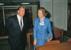 Mawlana Hazar Imam and Prime Minister Margaret Thatcher tour the library of the Ismaili Centre, London.