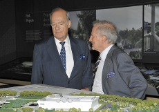 Prince Amyn and Luis Monreal, General Manager of the Aga Khan Trust for Culture, discuss the architectural model of the Ismaili Centre, the Aga Khan Museum and their Park.