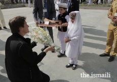 Prince Aly Muhammad is presented a bouquet of flowers upon his arrival in Aliabad, Hunza, Gilgit-Baltistan.