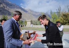 Prince Aly Muhammad is presented a traditional musical instrument upon his arrival in Aliabad, Hunza, Gilgit-Baltitsan