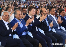 Prince Hussain and Prince Aly Muhammad enjoy an International Talent Showcase performance at Portugal Pavillion Canopy, during the Diamond Jubilee Celebration.