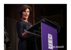 Former First Lady of the United States, Laura Bush introduces Sesame Workshop as an award recipient, alongside First Lady of Afghanistan, Rula Ghani.