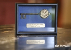 The Key to the City of Sugar Land, which was presented to Mawlana Hazar Imam in recognition of his Diamond Jubilee by Mayor Zimmerman upon Hazar Imam’s arrival in Texas today.