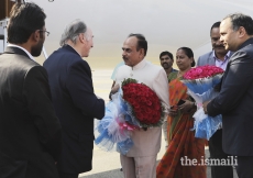 Mawlana Hazar Imam is greeted by Deputy Chief Minister Mr Mohammed Mahmood Ali upon his arrival in Hyderabad, as Telangana Chief Secretary Dr Shailendra Kumar Joshi (right) looks on.