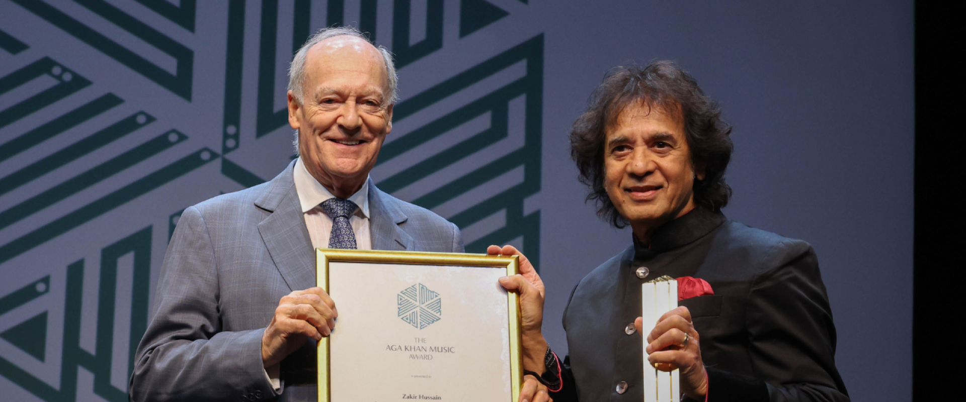 Prince Amyn presents the 2022 Aga Khan Music Award for Lifetime Achievement to Zakir Hussain.