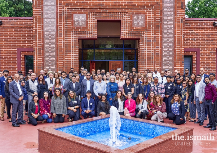 The Ismaili Council and the civic leaders gather outside the Atlanta Headquarters Jamatkhana fountain for a photograph.
