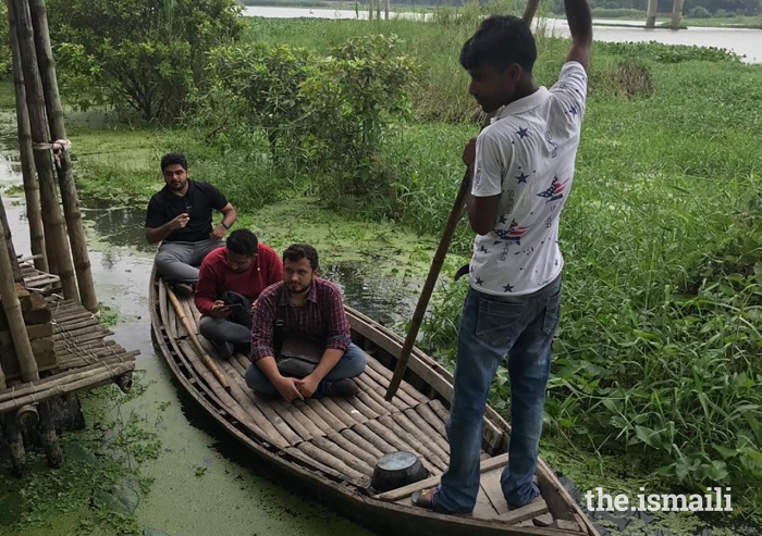 Participants enroute, via boat, to the Arcadia Education Project. The school, which won the 2019 Award, is an amphibious structure, built on land, that is flood-prone.