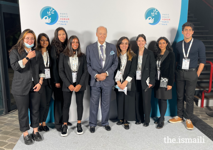 Prince Amyn with Ismaili volunteers at the Paris Peace Forum on 11 November 2021. 