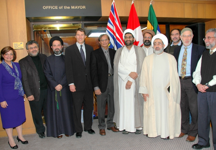 Leaders from British Columbia’s Muslim communities, including Ismaili Council President Samira Alibhai, gather at Vancouver City Hall with Mayor Gregor Robertson to commemorate Eid al-Adha.
