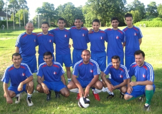 The Ismaili football team &lt;em&gt;United France&lt;/em&gt; poses for a team photograph. 