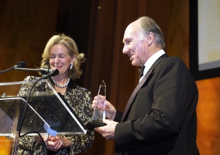 Carolyn Schwenker Brody, Chair of the National Building Museum's Board of Trustees, presents the Vincent Scully Prize, a crystal obelisk, to Mawlana Hazar Imam